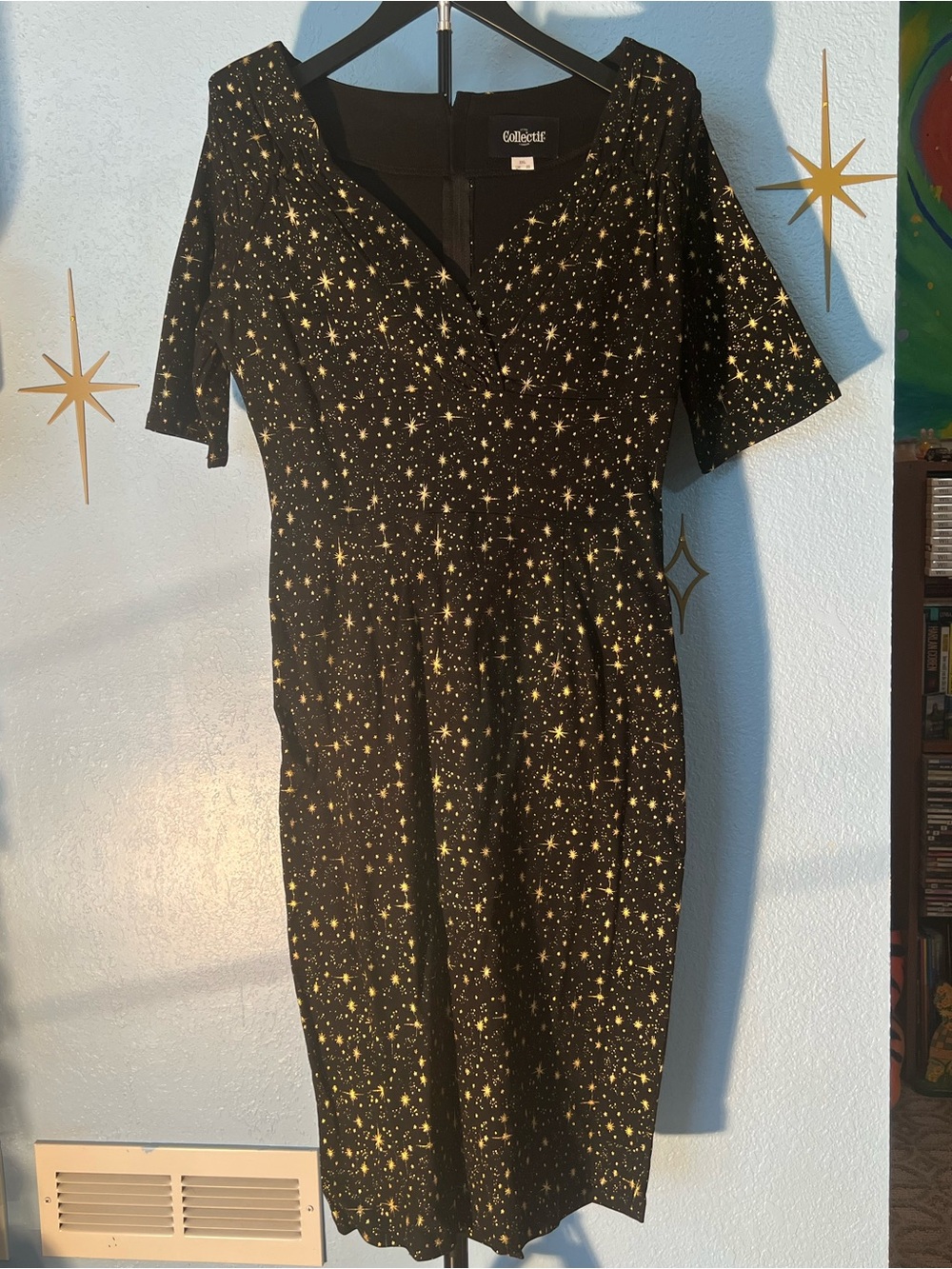Collectif Black Dress with Gold Star Print
